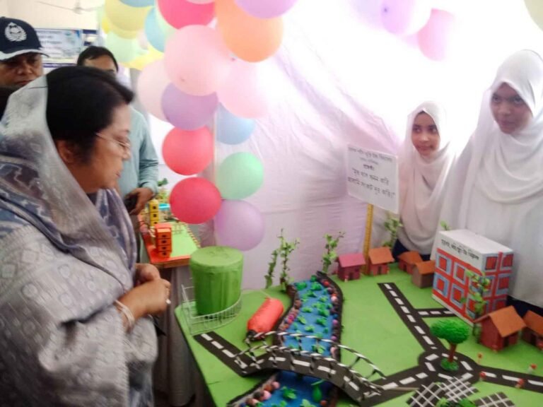 সাটুরিয়ায় ছবি-স্টল পরিদর্শন করছেন বেসামরিক বিমান ও পর্যটন মন্ত্রী